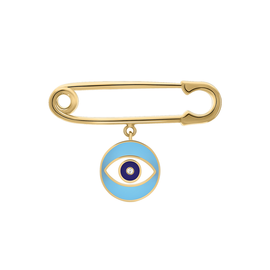 A gold pin with a blue and white enamel evil eye symbol and a centered diamond