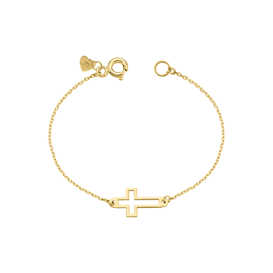 A delicate 18K yellow-gold baby bracelet on a fine adjustable paper-clip chain, featuring a slim open-work cross silhouette charm at its center, shown on a transparent background.