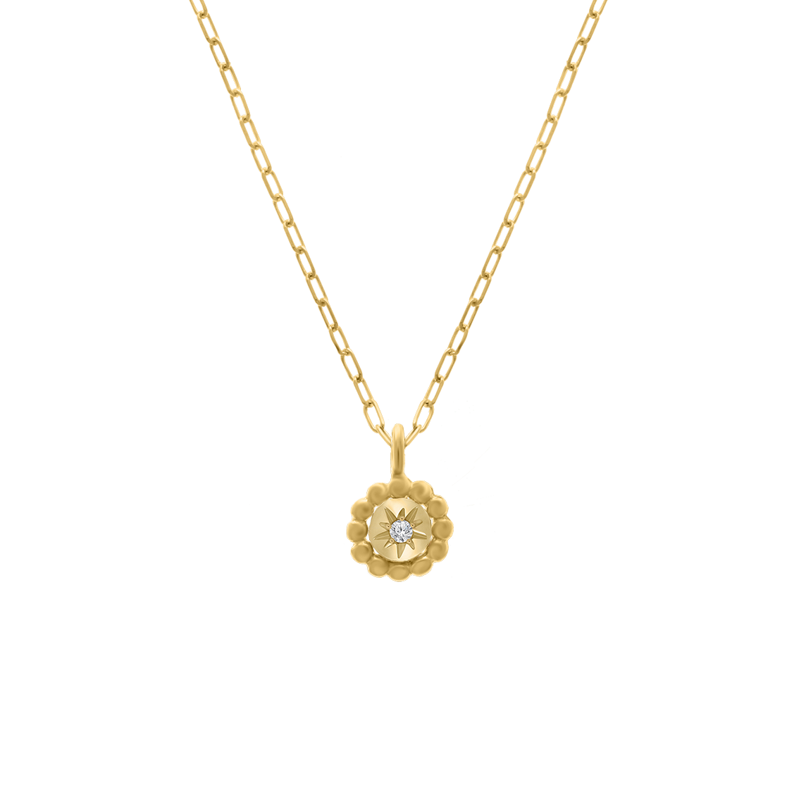 Mini Stellar Coin Necklace featuring a round beaded-edge pendant in 18K gold, with a sparkling diamond starburst design at its center, suspended on a delicate chain.