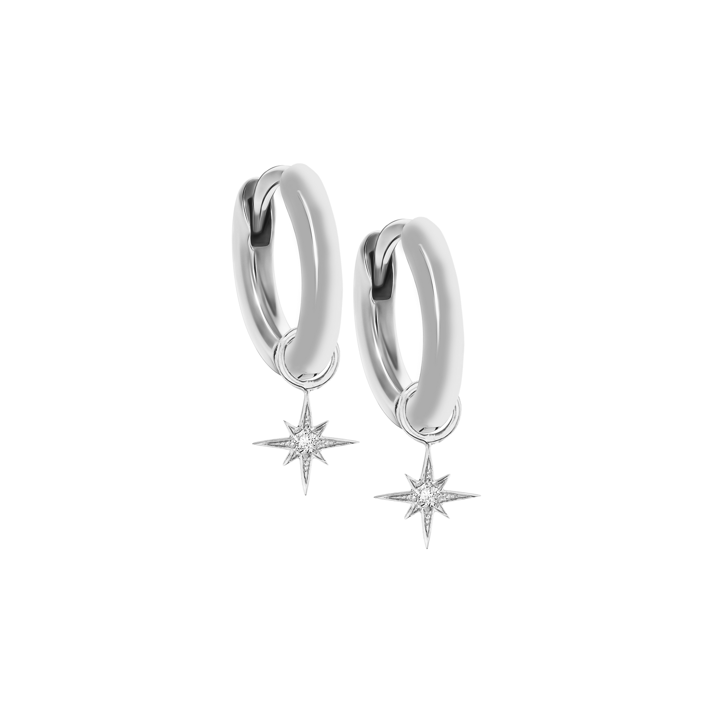 A pair of 18K white-gold mini hoop earrings, each hoop suspending a small eight-point star charm set with a single round brilliant-cut diamond at its center, shown side by side on a transparent background.