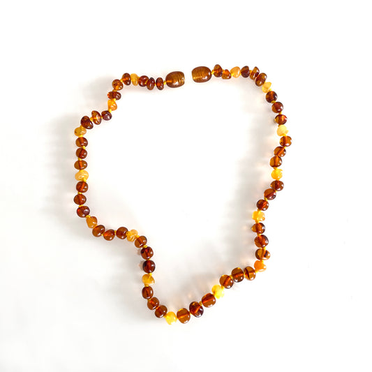 Multicolor amber baby necklace with polished honey and cognac beads