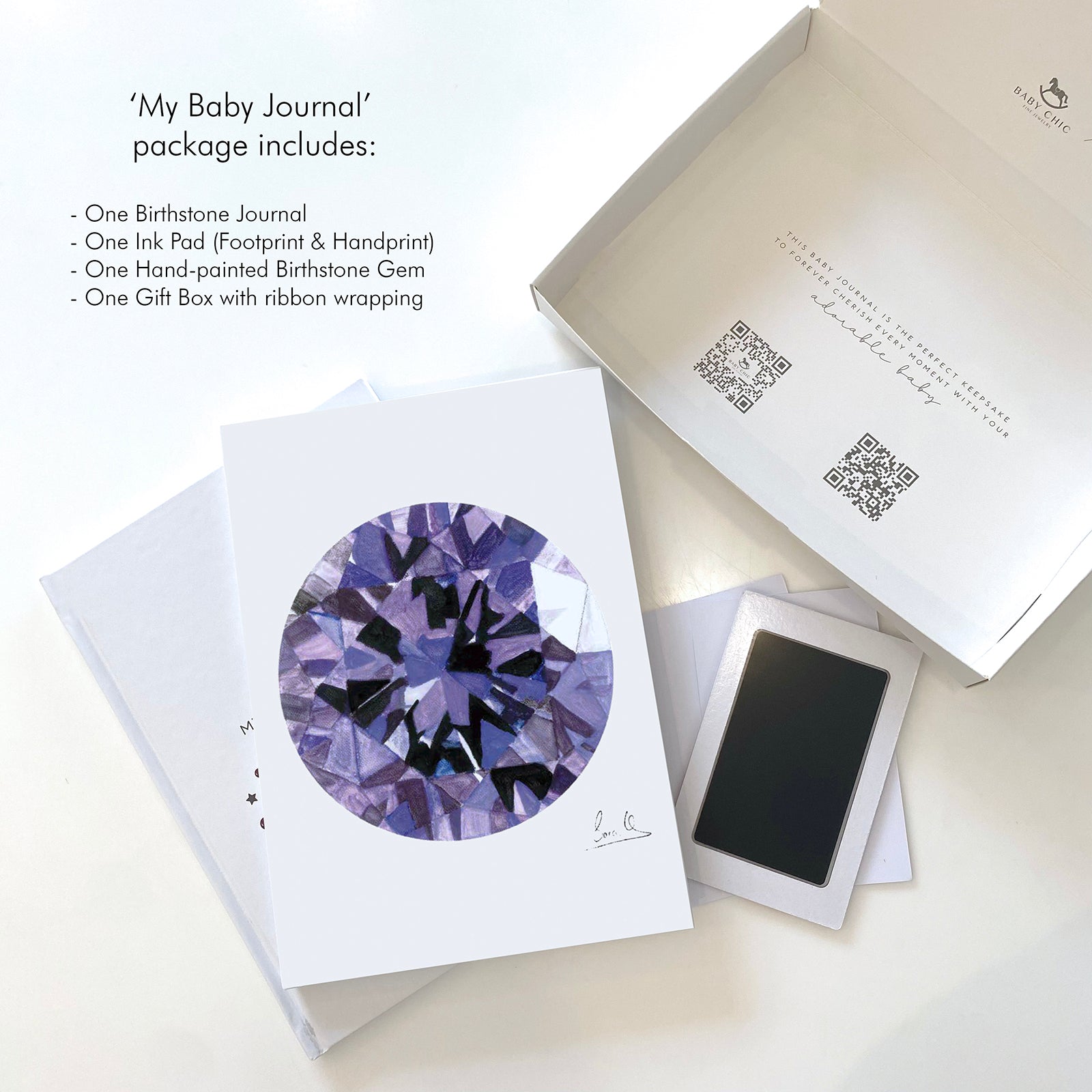 Amethyst baby journal with ink pad and hand-painted gem in gift box.