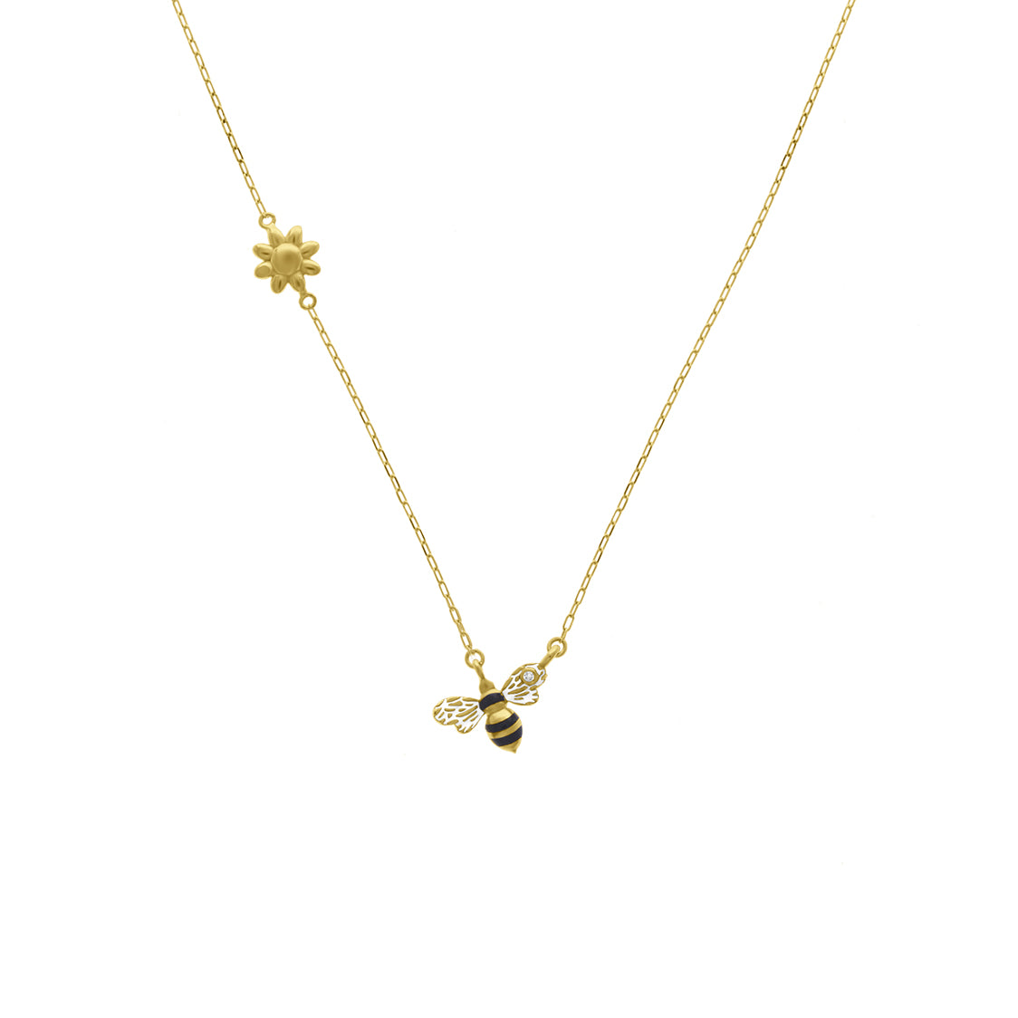 Gold necklace featuring a daisy charm on one side and a black-and-yellow enamel bee with a diamond accent on the other, displayed on a white background.
