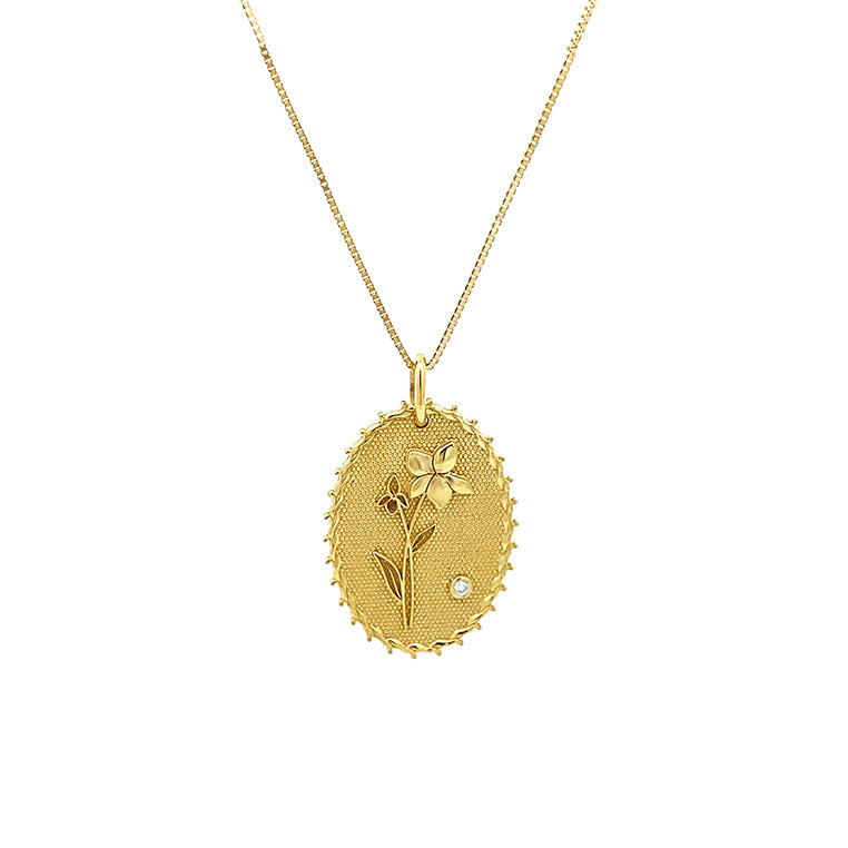 Gold February birth flower necklace with violet engraving and diamond accent