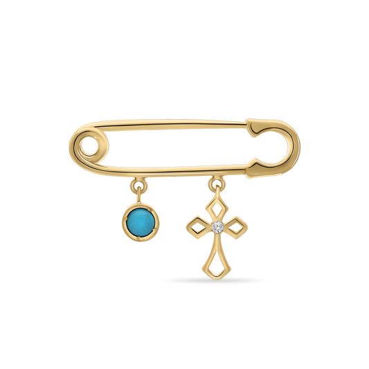 A polished 18K yellow-gold safety-pin brooch (baby-pin style) with two dangling charms: a round bezel-set turquoise stone and an openwork cross pendant featuring a single round brilliant-cut diamond at its center, shown on a transparent background.