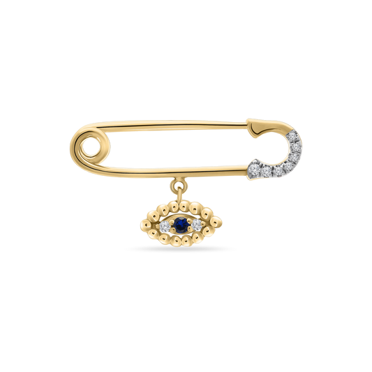 A polished 18K yellow-gold safety-pin brooch with the clasp tip encrusted in small round diamonds, featuring a dangling evil-eye charm—an oval of gold beads surrounding a central blue sapphire and two small diamonds—shown on a transparent background.