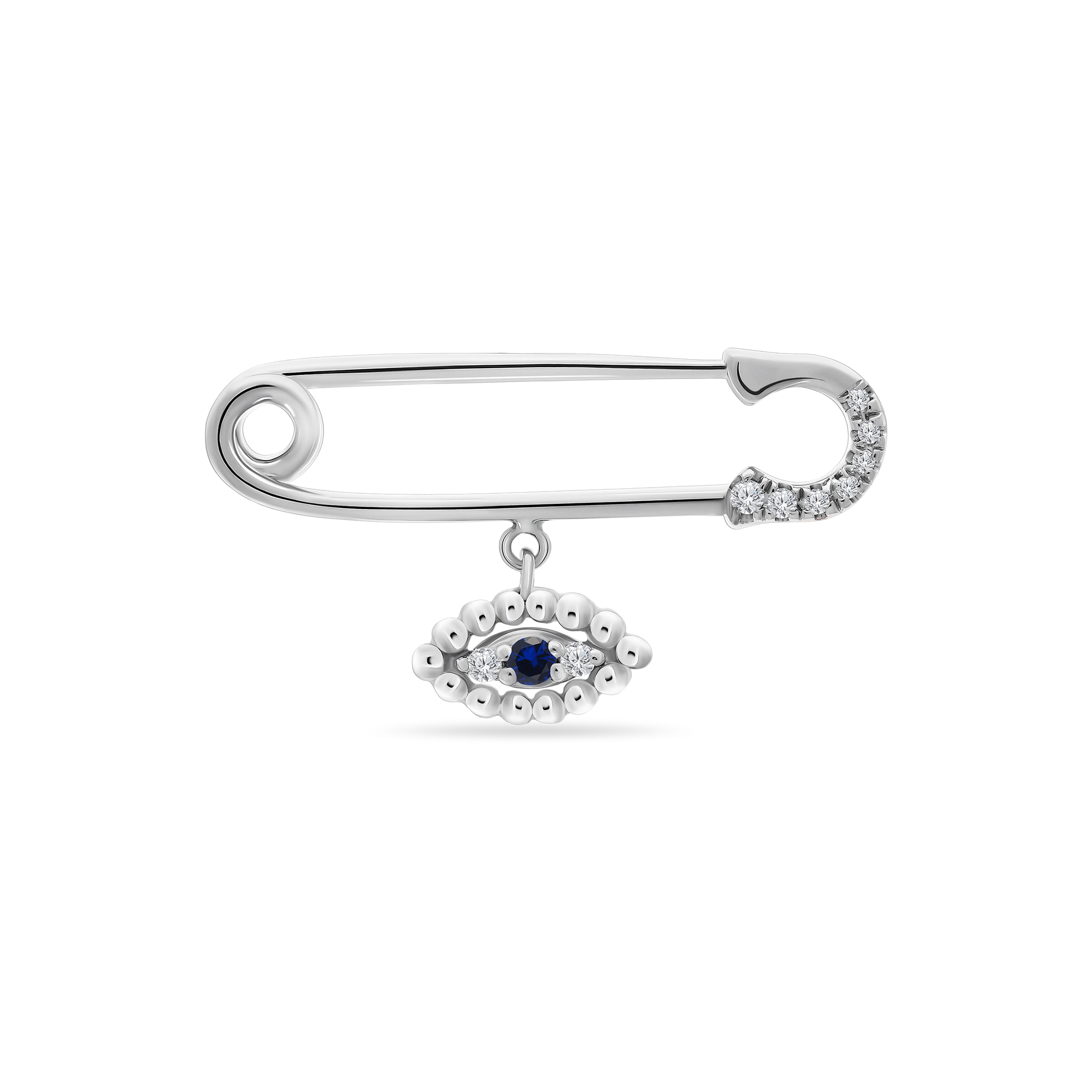 A polished 18K white-gold safety-pin brooch with the clasp tip encrusted in small round diamonds, featuring a dangling evil-eye charm—an oval of gold beads surrounding a central blue sapphire and two small diamonds—shown on a transparent background.