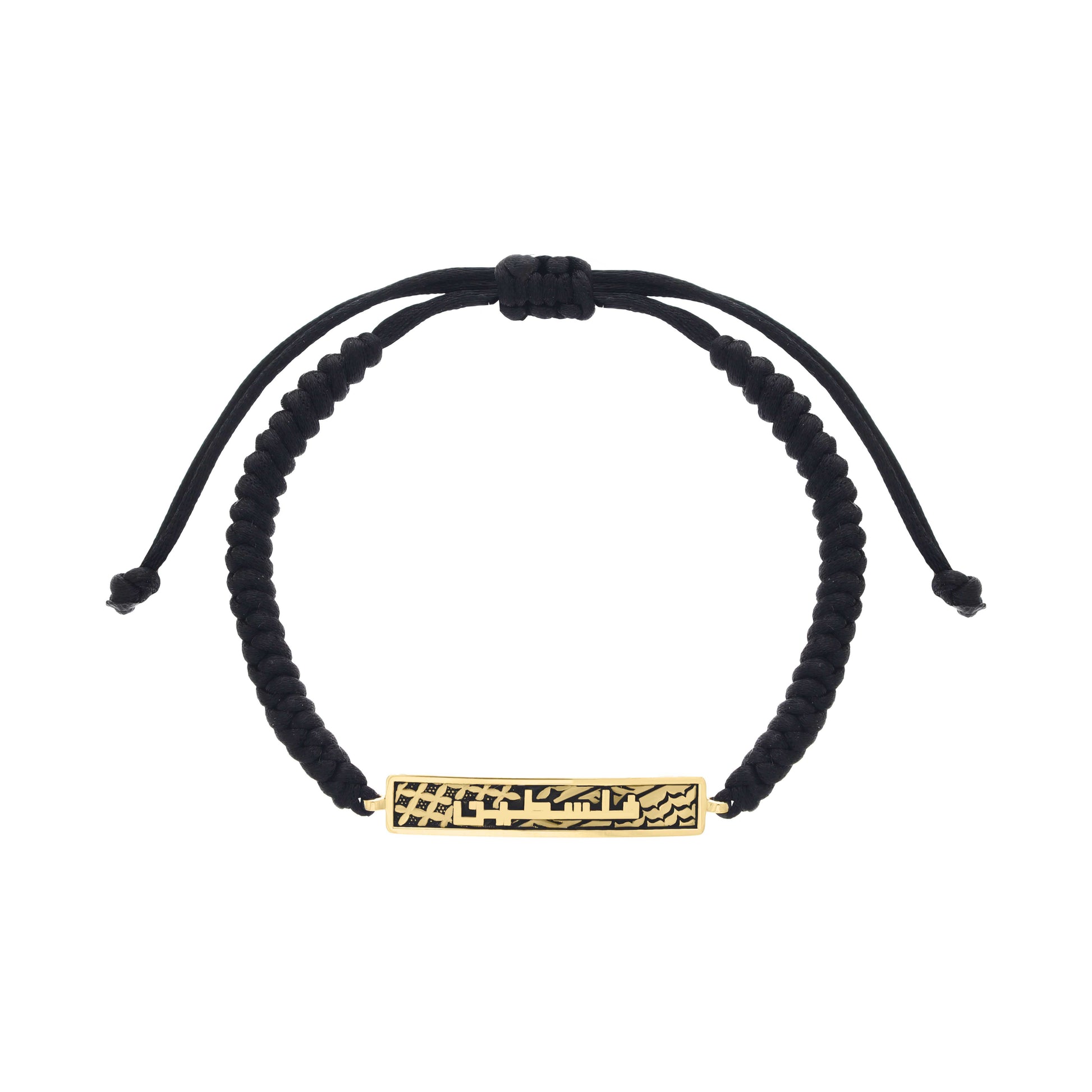 Black adjustable cord bracelet with a rectangular gold plate engraved in Arabic calligraphy reading “فلسطين” (Falasteen), meaning Palestine.