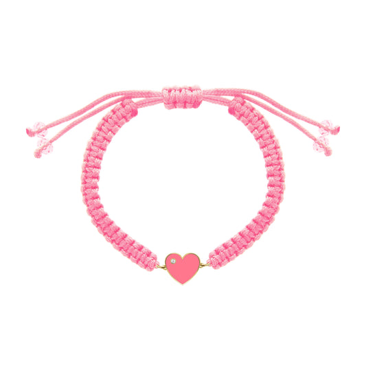 Pink macrame bracelet with a gold heart-shaped centerpiece filled with pink enamel and a tiny diamond accent.