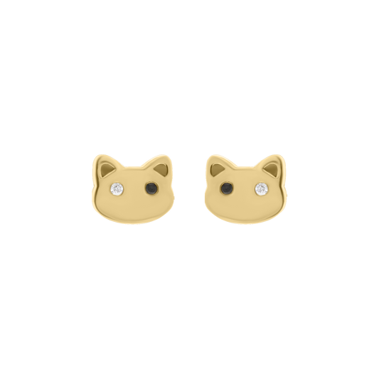 Pair of gold cat face silhouette stud earrings with one black and one white diamond for eyes, displayed on a transparent background.
