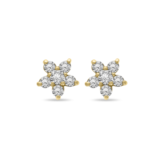 A pair of 18K yellow-gold Little Flora stud earrings, each fashioned as a five-petal flower of round brilliant-cut diamonds set in prongs, shown side by side on a transparent background.