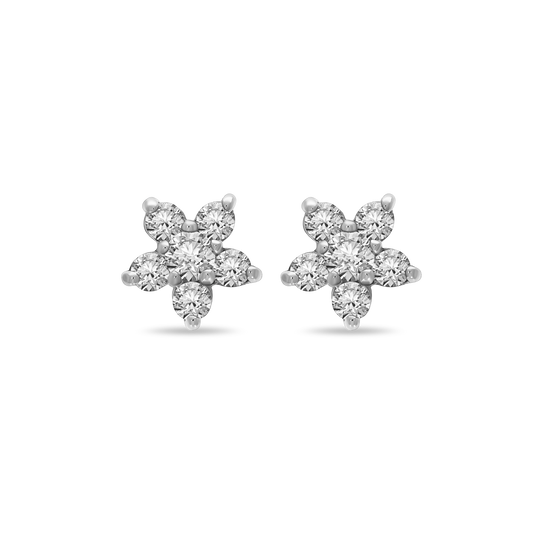 A pair of 18K white-gold Little Flora stud earrings, each fashioned as a five-petal flower of round brilliant-cut diamonds set in prongs, shown side by side on a transparent background.
