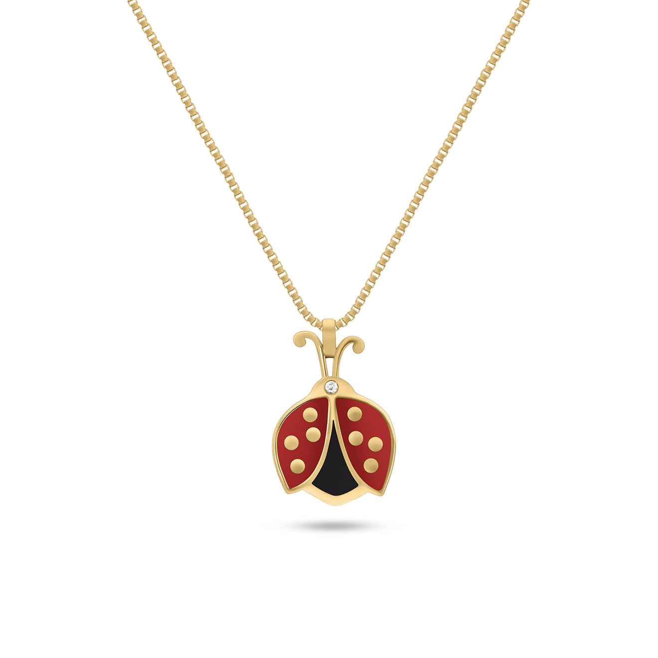 18K Gold necklace with a gold ladybug pendant adorned with vibrant red and black enamel.