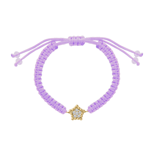 Purple woven cord bracelet showcasing a gold and diamond star charm, finished with matching purple bead-tipped adjustable ties.