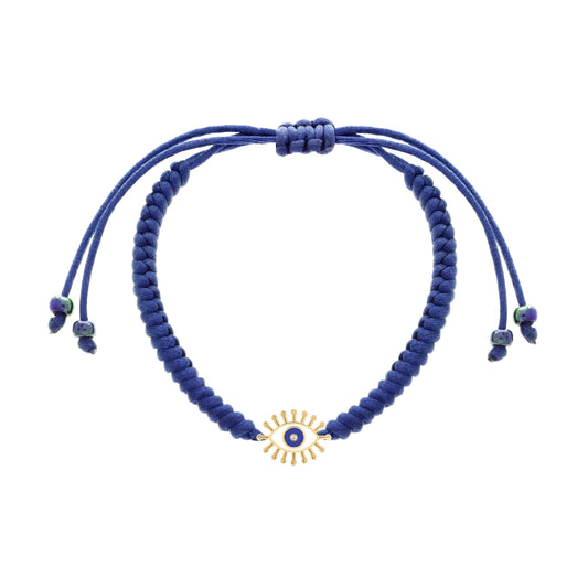 Adjustable navy blue cord bracelet featuring a gold evil eye charm with radiant lashes, a blue enamel center, and a tiny diamond.
