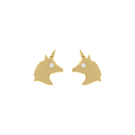 Pair of gold unicorn silhouette stud earrings with a small diamond detail for the eye, displayed on a transparent background.