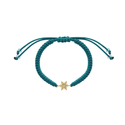Teal braided cord bracelet with yellow gold snowflake charm and diamond center